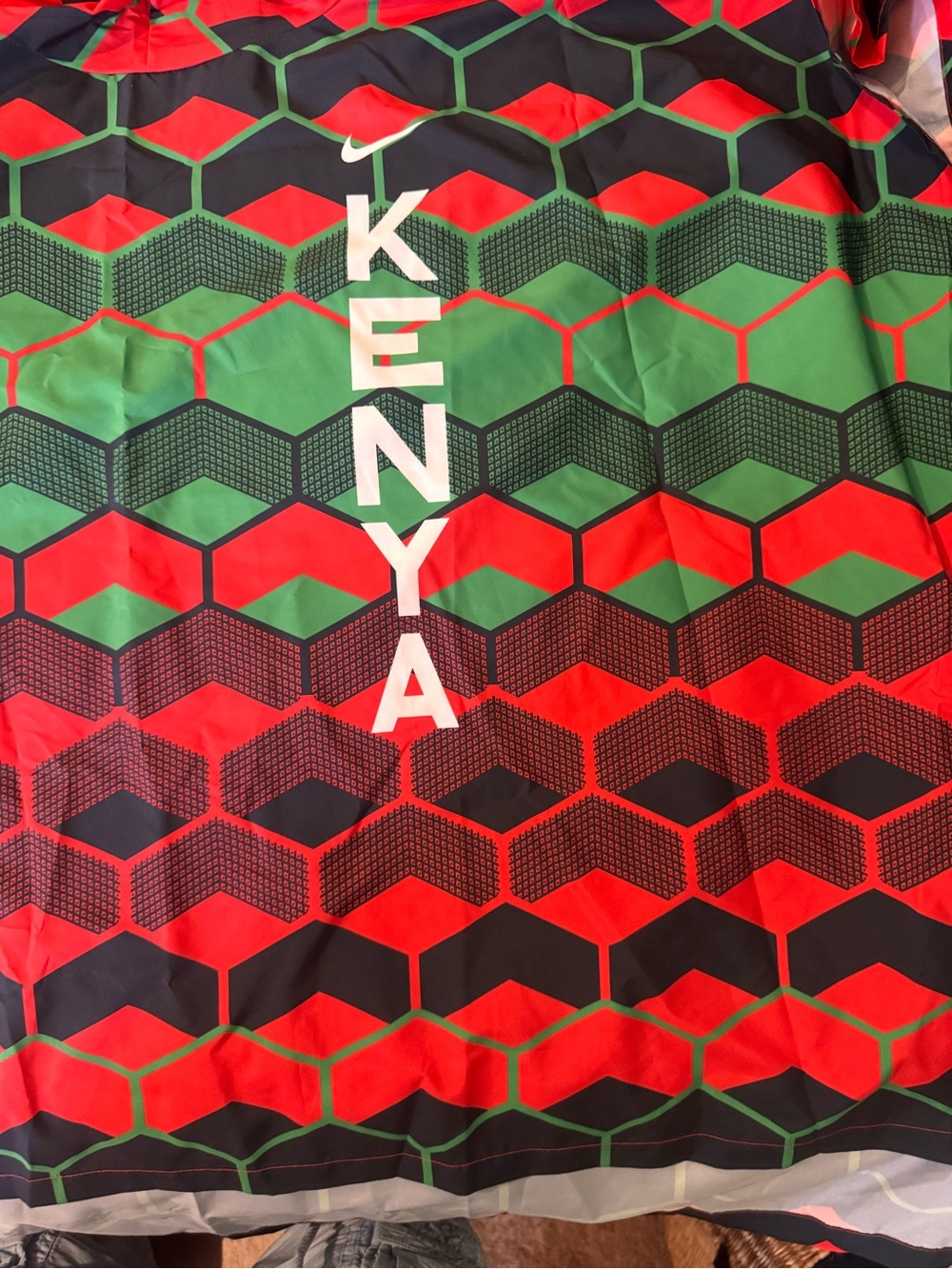 the Nike Team Kenya Marathoner Poncho Jacket